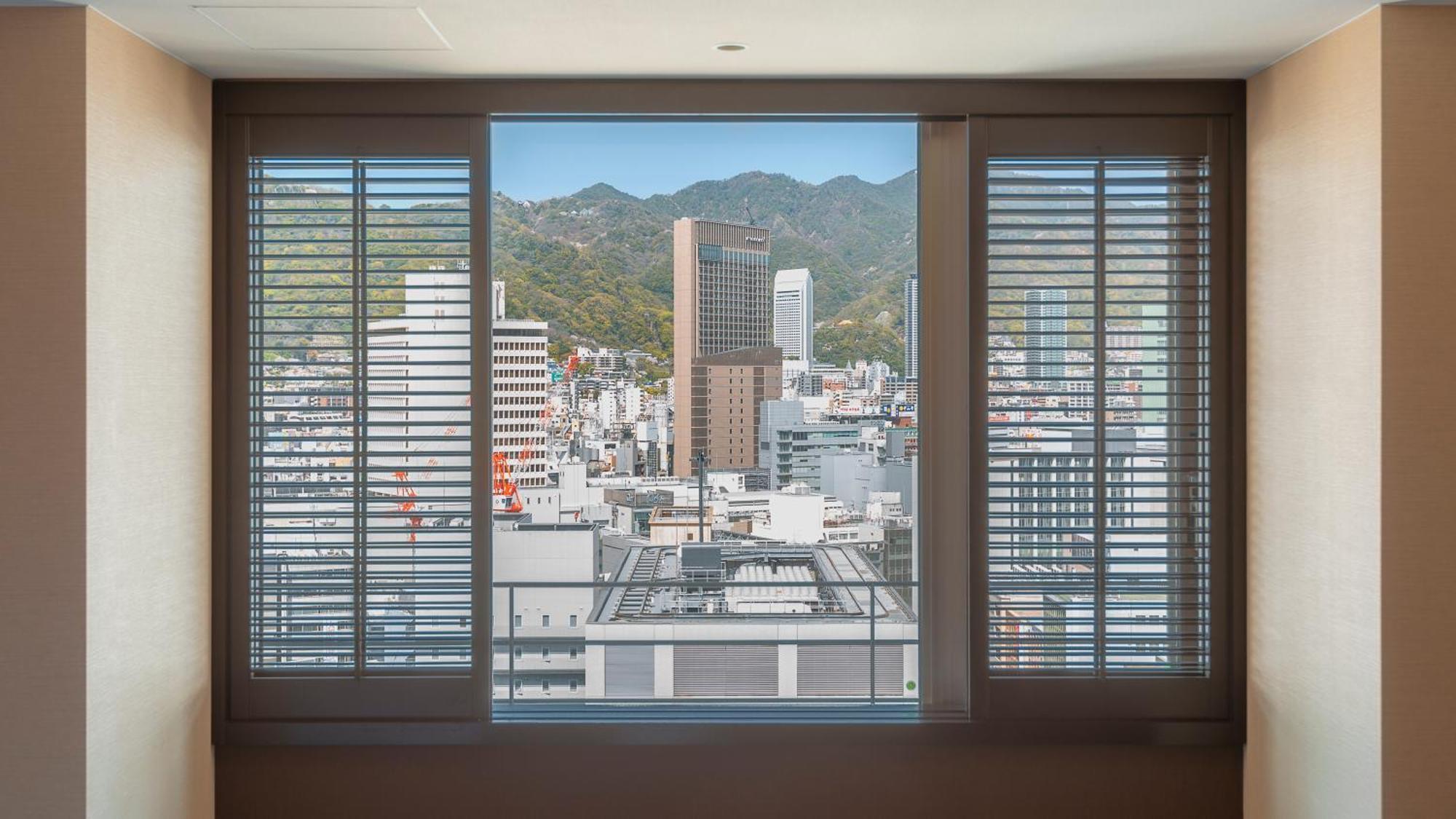 Oriental Hotel Kobe Exteriör bild A window with louvres